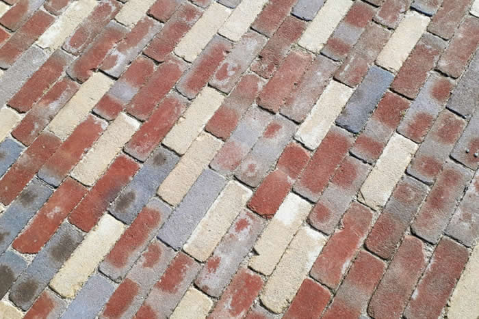 pressure washing damaging brick pavers
