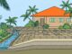 Pavers sit over compacted layers as a drainage channel carries rain away from a Florida home.