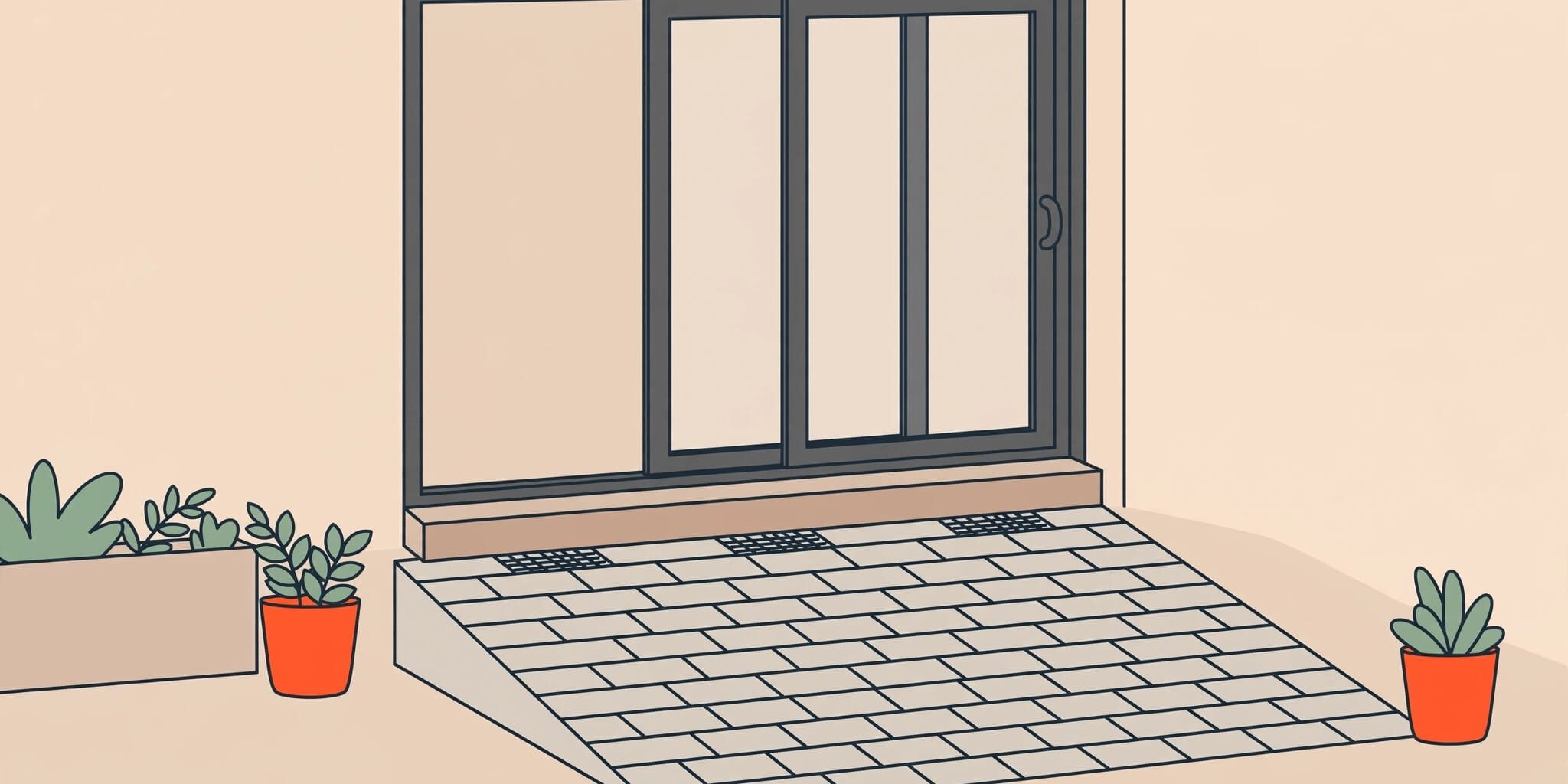 A sliding glass door above a sloped paver patio.